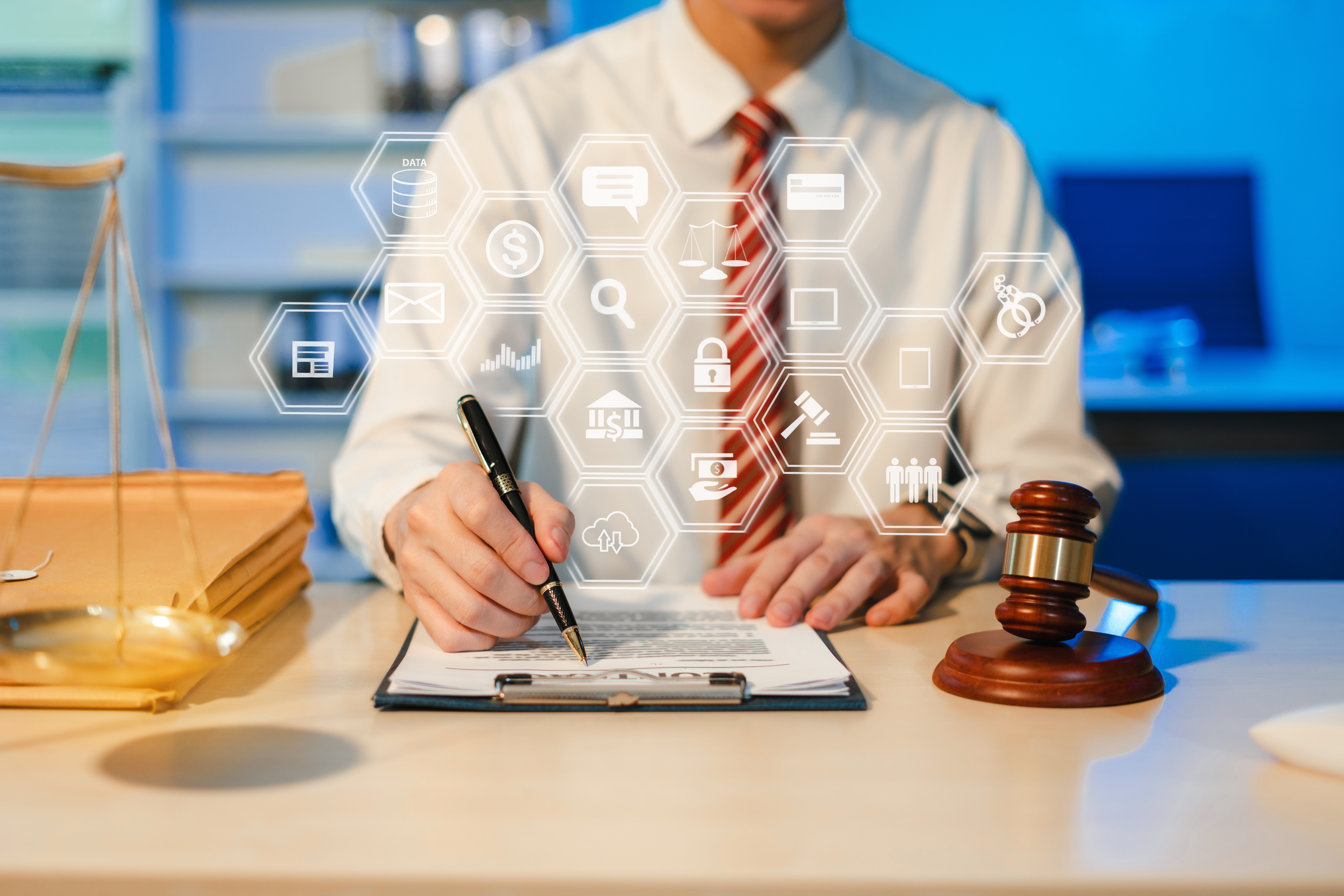 man at desk with criminal justice icons around him