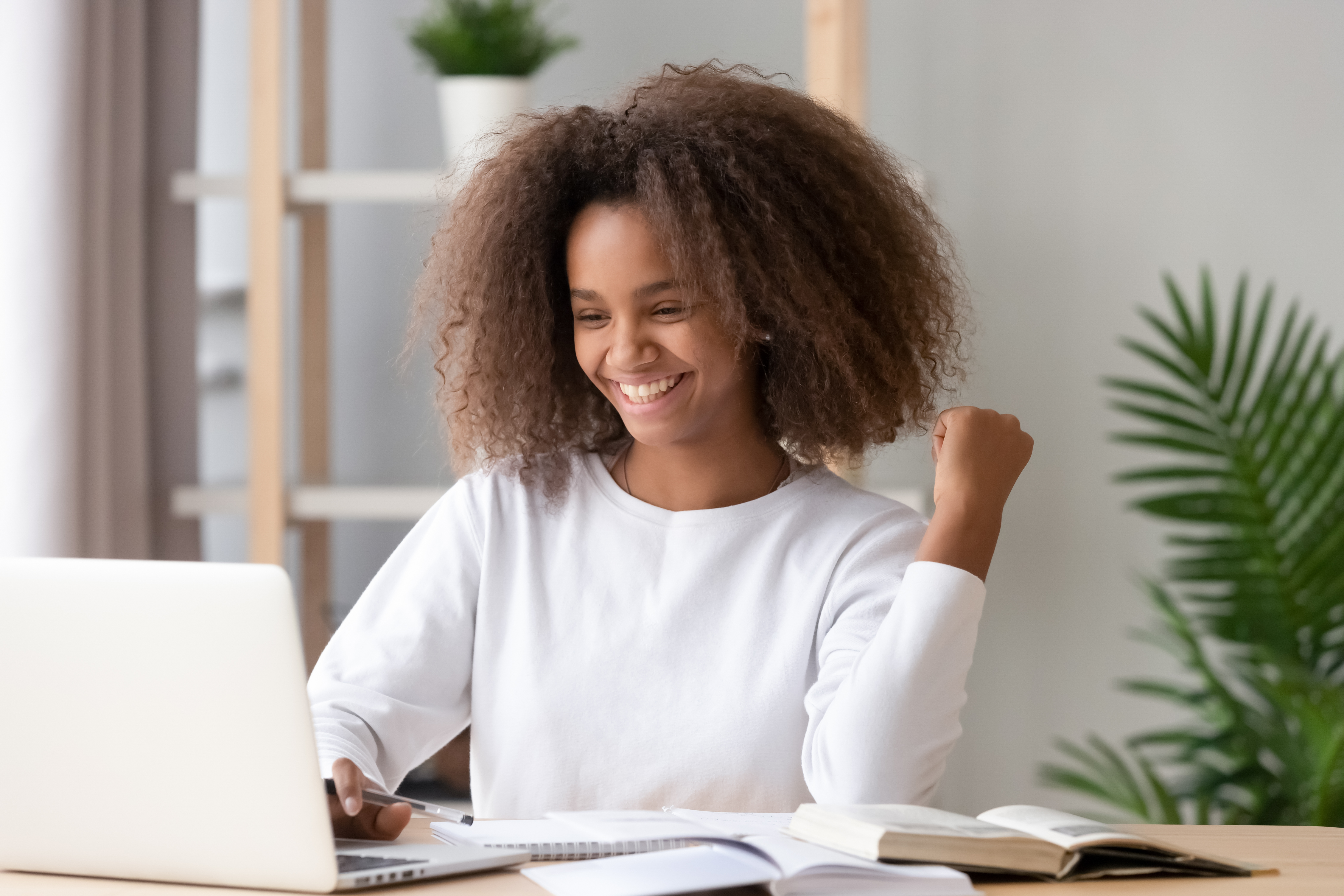 female student in front of laptop