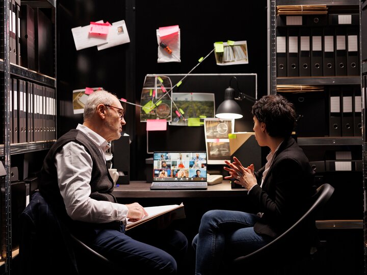 2 people in an evidence room