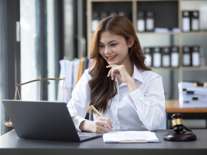 Woman in front of laptop